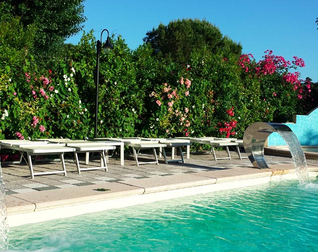 Water cascades into the pool